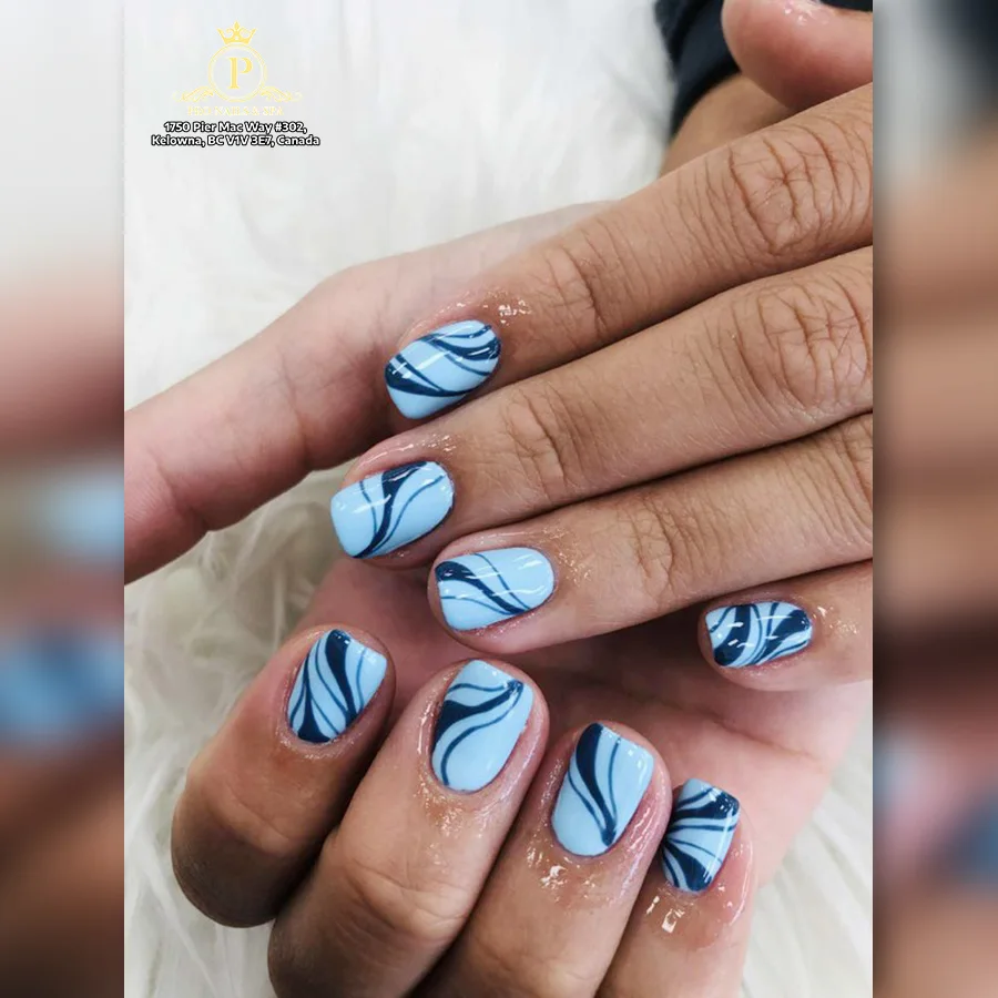Blue leaf pattern nail art