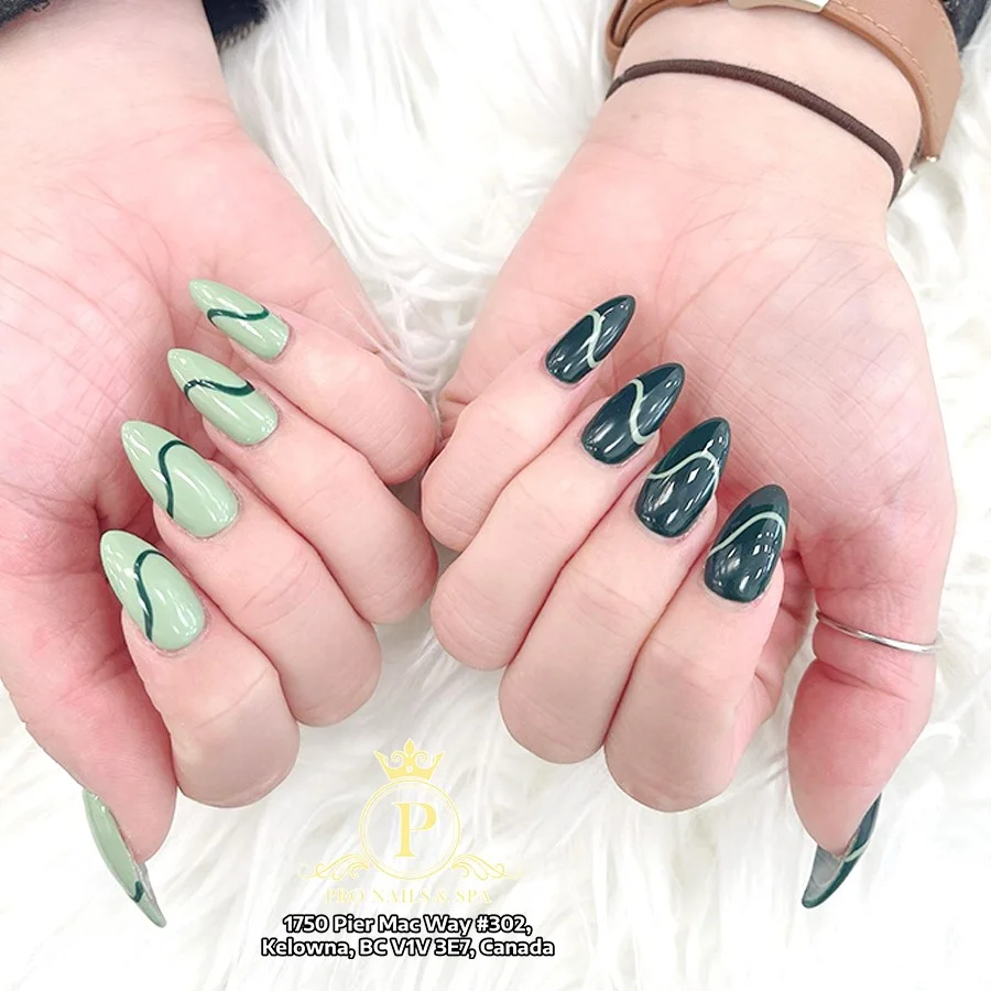 Mint and dark green abstract manicure